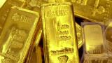 طلای جهانی به پایین ۱۳۰۰ دلار سقوط كرد